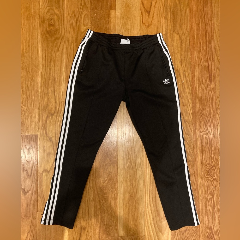 Adidas track pants with zipper pockets and ankle (3 stripe design)
